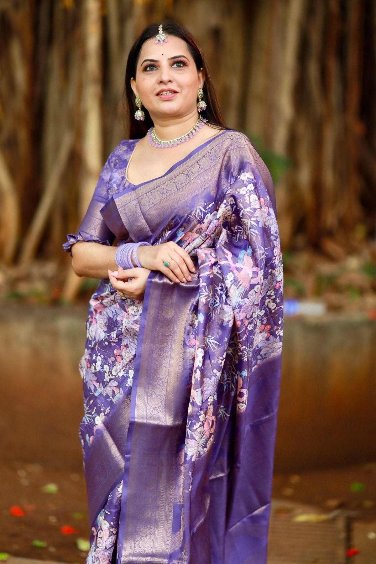 Regal Purple Banarasi Silk Saree with Floral Motifs and Elegant