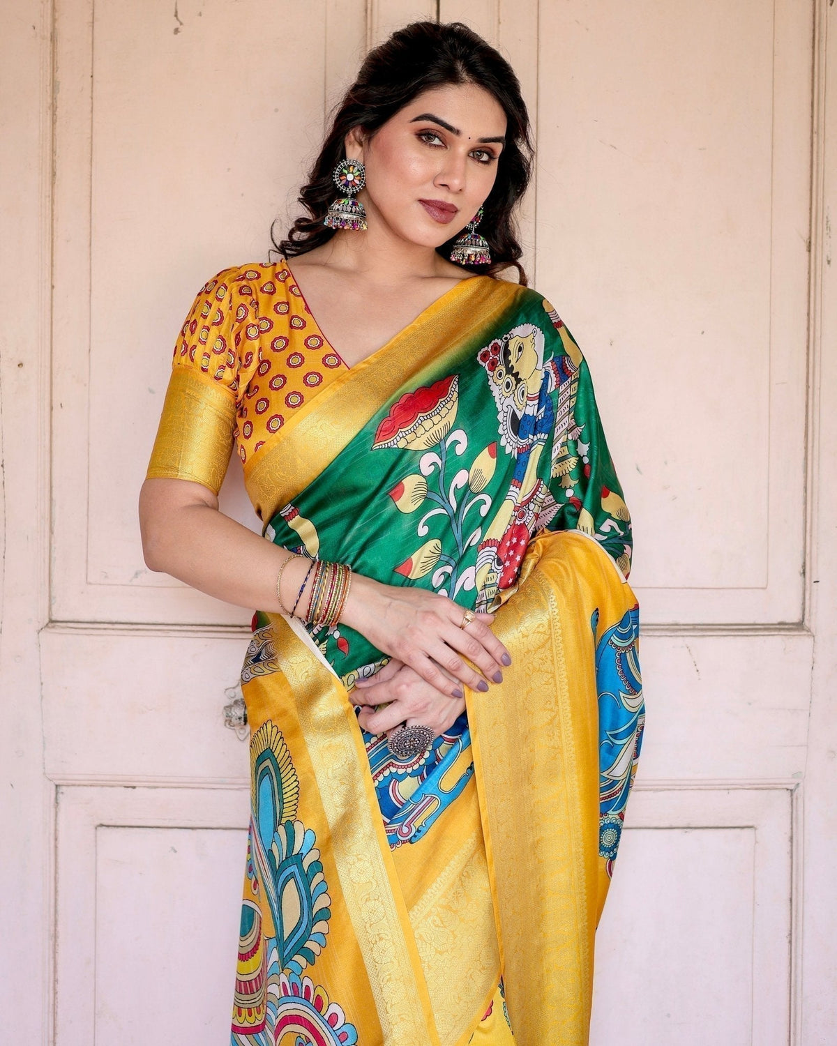 Golden Yellow Tussar Silk Saree with Vibrant Peacock Kalamkari Motifs