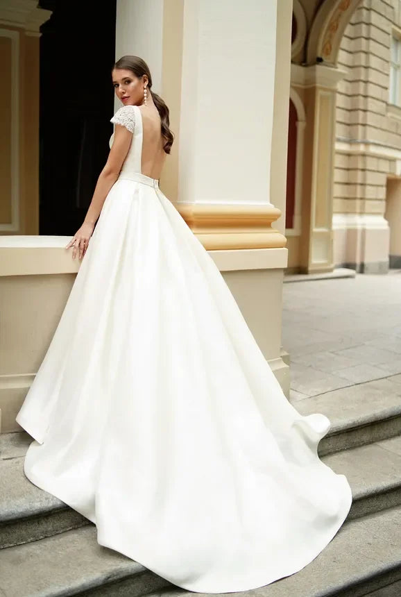 Simple Satin A-Line Wedding Dress Jewel Neck Short Capped Sleeves Backless with Ruched Sash Sweep Train Modern Beach Style