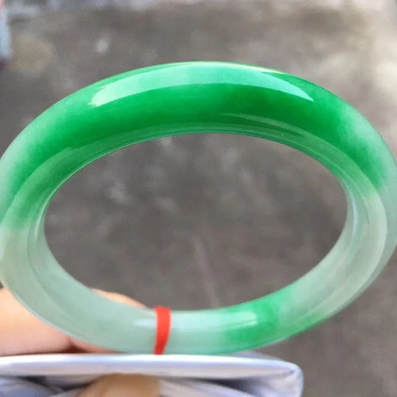 Natural Myanmar jade bracelet, round shape, genuine, ice-like texture, with a vibrant green color and floral patterns, a ja