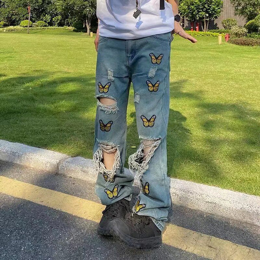 Butterfly Embroidered Torn Jeans For Men 2