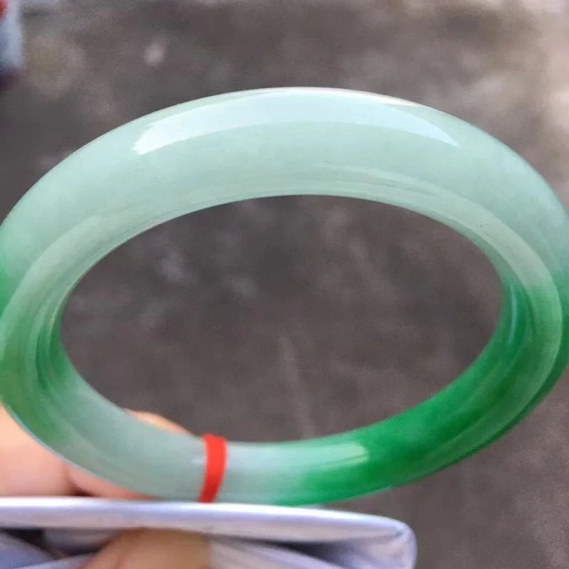 Natural Myanmar jade bracelet, round shape, genuine, ice-like texture, with a vibrant green color and floral patterns, a ja