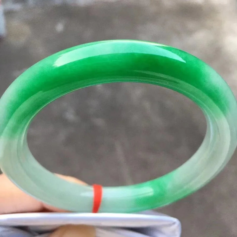 Natural Myanmar jade bracelet, round shape, genuine, ice-like texture, with a vibrant green color and floral patterns, a ja