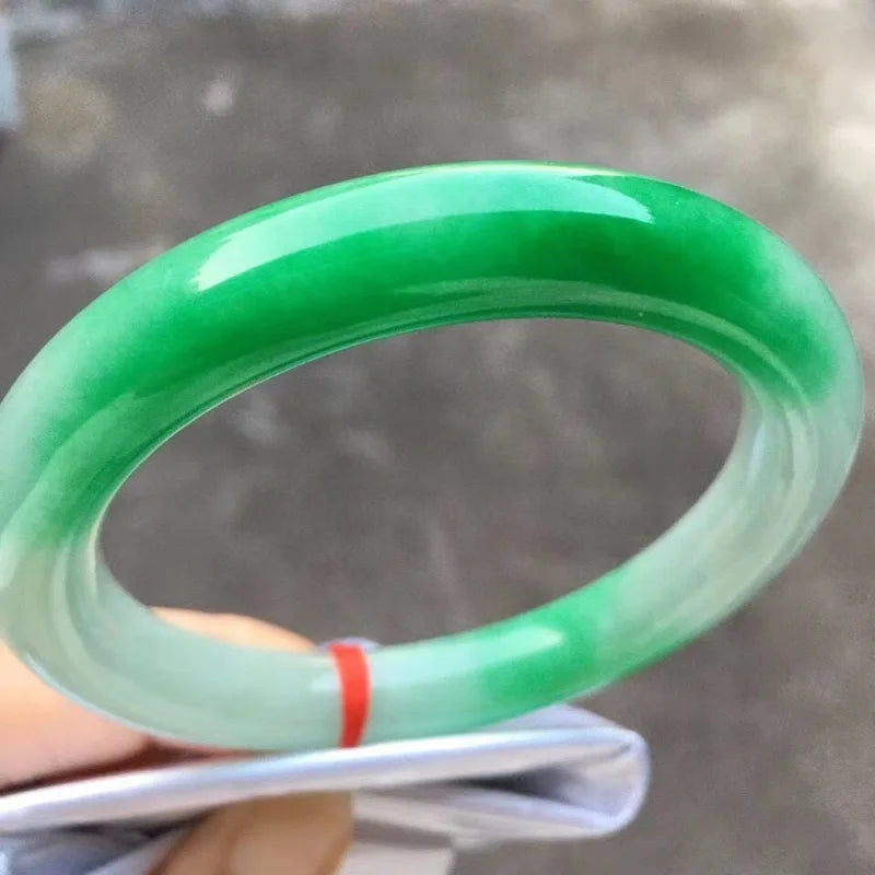 Natural Myanmar jade bracelet, round shape, genuine, ice-like texture, with a vibrant green color and floral patterns, a ja