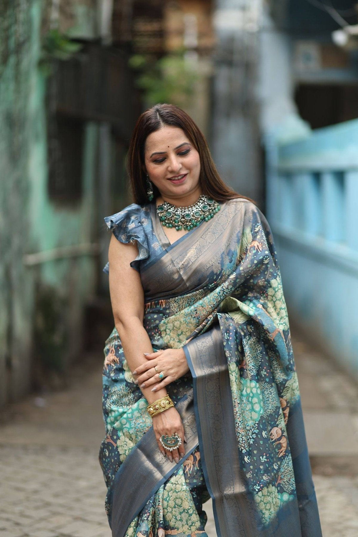 Elegant Teal Blue Banarasi Silk Saree with Forest-Inspired Motifs and