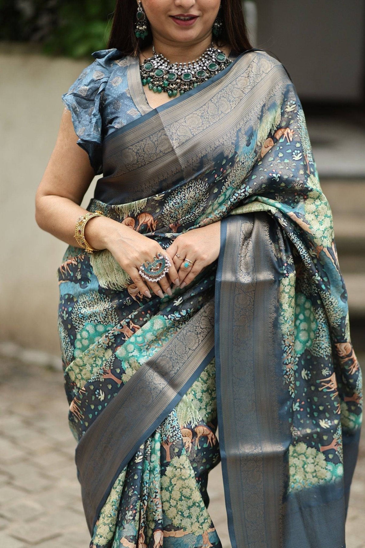 Elegant Teal Blue Banarasi Silk Saree with Forest-Inspired Motifs and