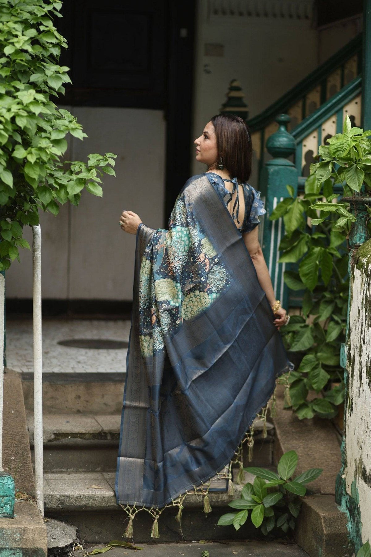 Elegant Teal Blue Banarasi Silk Saree with Forest-Inspired Motifs and