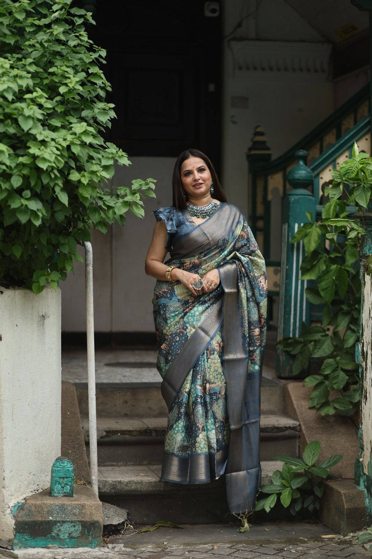 Elegant Teal Blue Banarasi Silk Saree with Forest-Inspired Motifs and