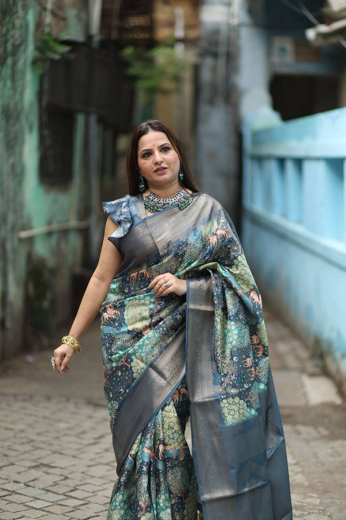 Elegant Teal Blue Banarasi Silk Saree with Forest-Inspired Motifs and