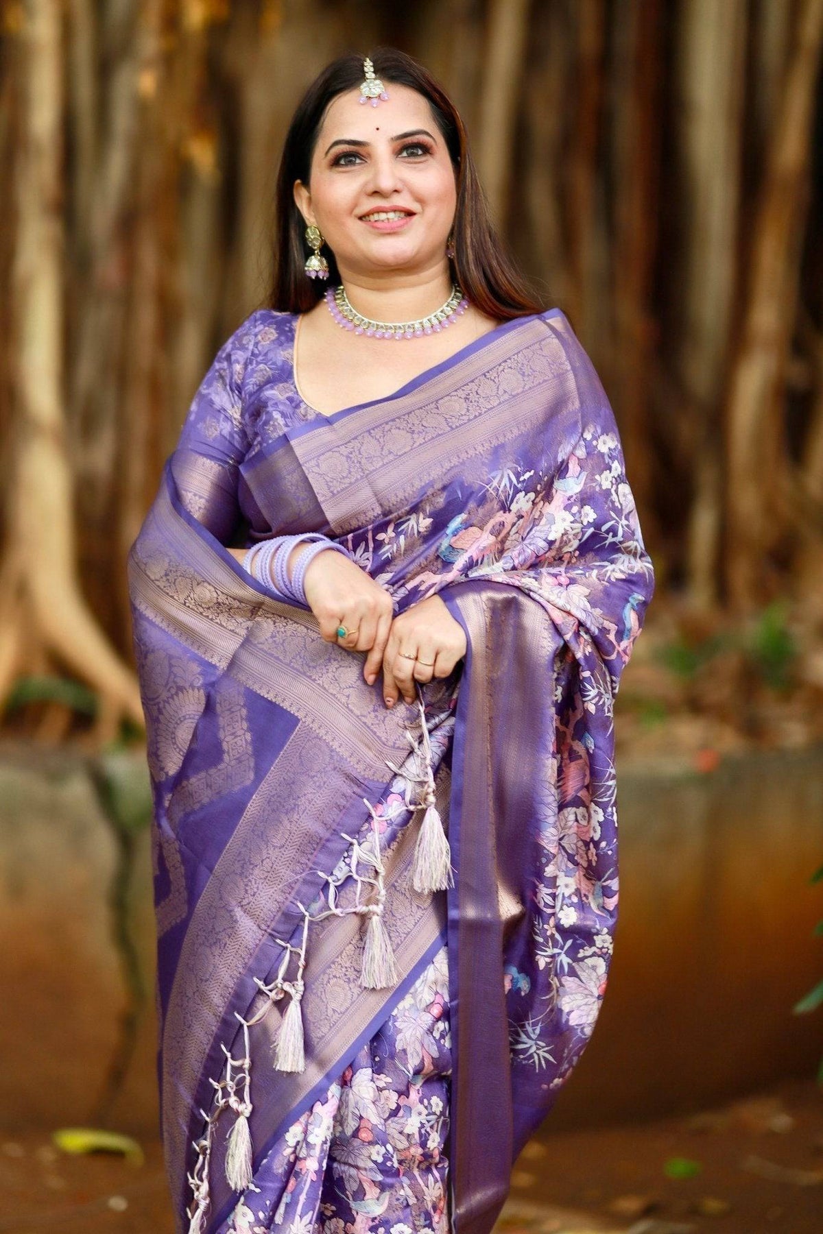 Regal Purple Banarasi Silk Saree with Floral Motifs and Elegant