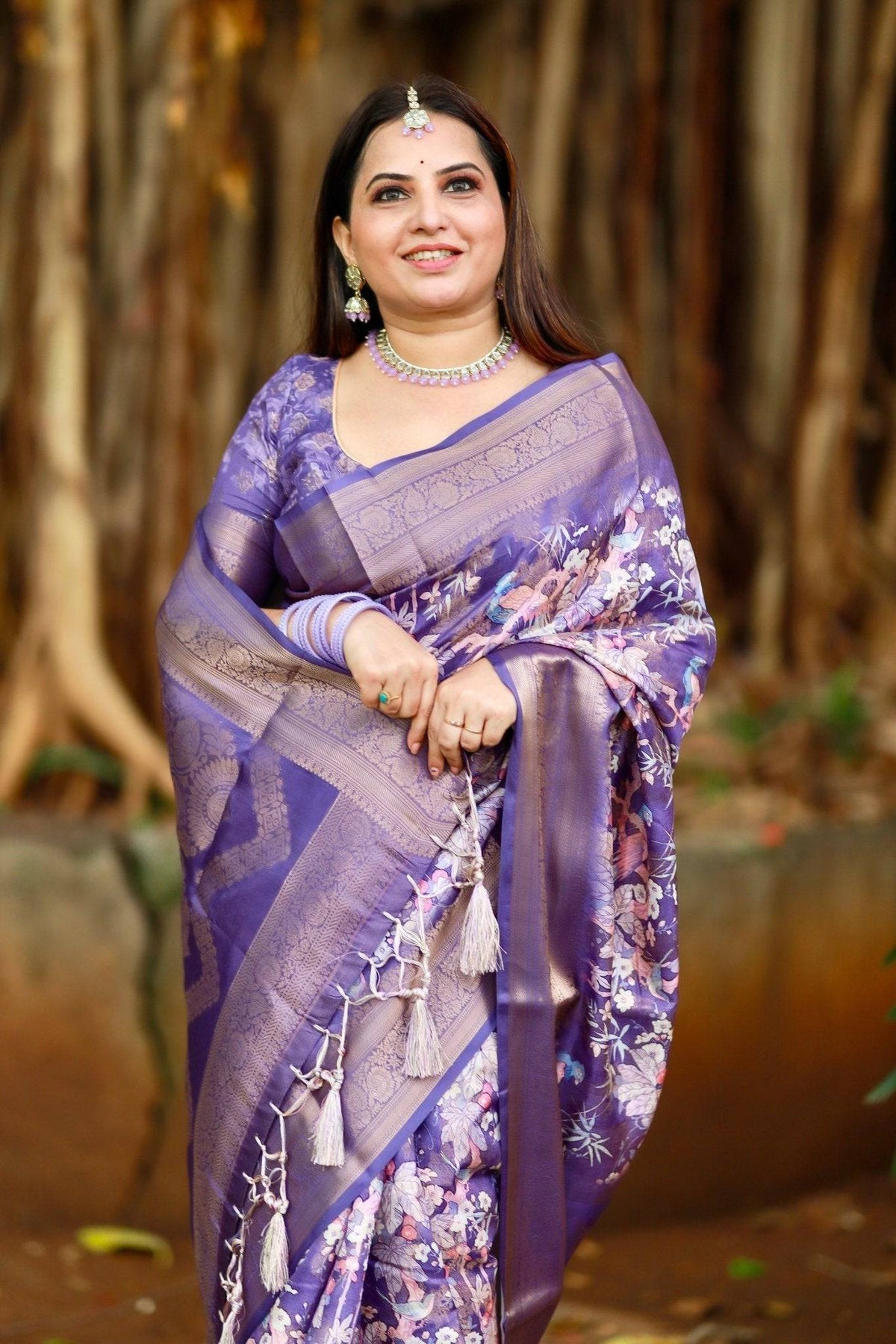 Regal Purple Banarasi Silk Saree with Floral Motifs and Elegant