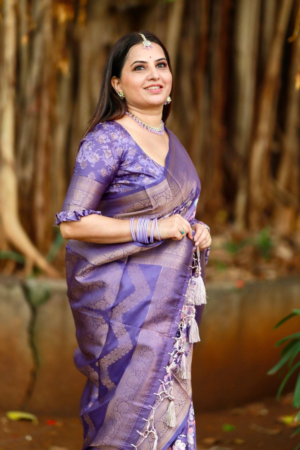 Regal Purple Banarasi Silk Saree with Floral Motifs and Elegant