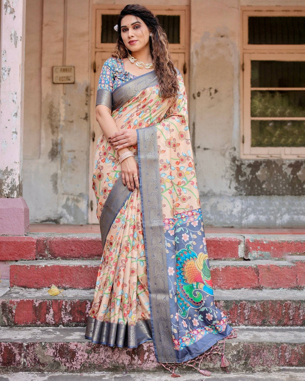 Peach and Navy Blue Floral Saree with Vibrant Peacock Pallu and Tassel