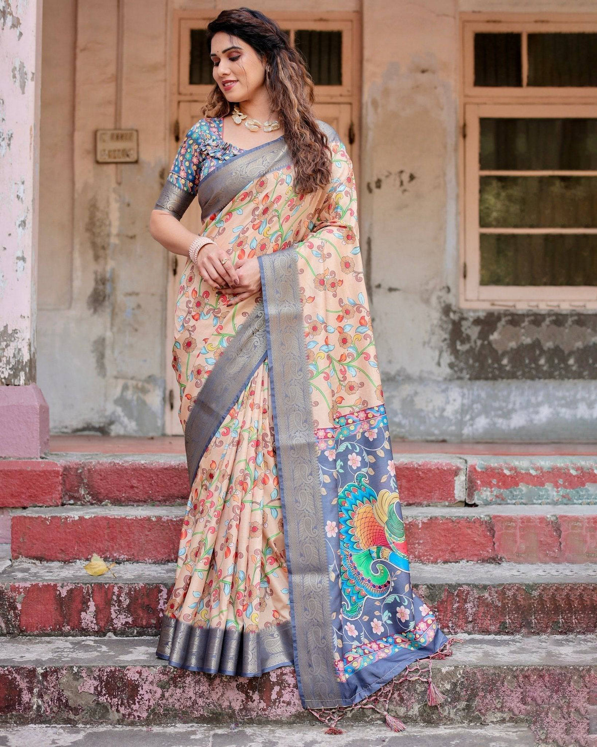 Peach and Navy Blue Floral Saree with Vibrant Peacock Pallu and Tassel
