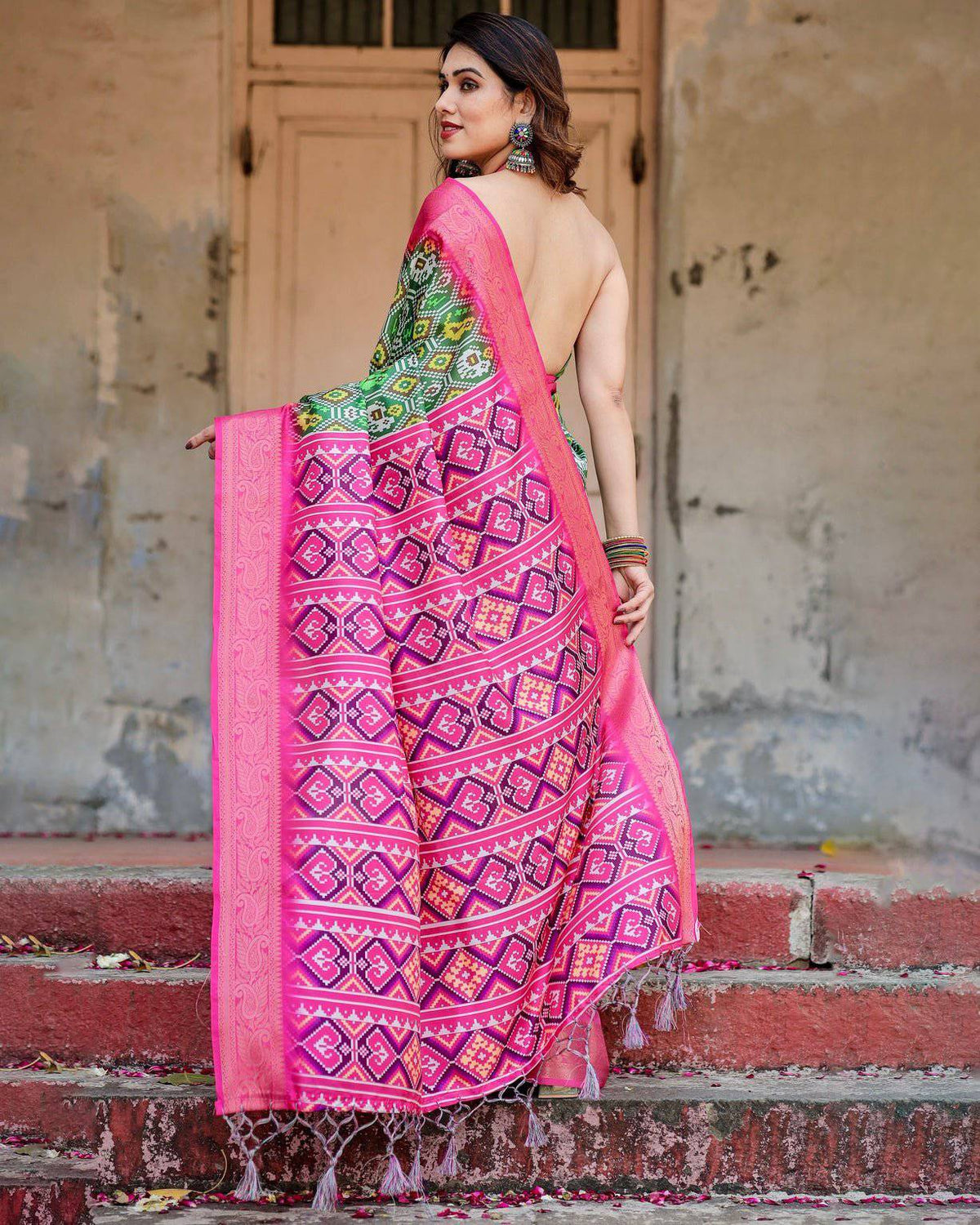 Green and Pink Tussar Silk Saree with Vibrant Ikat Patterns and Zari