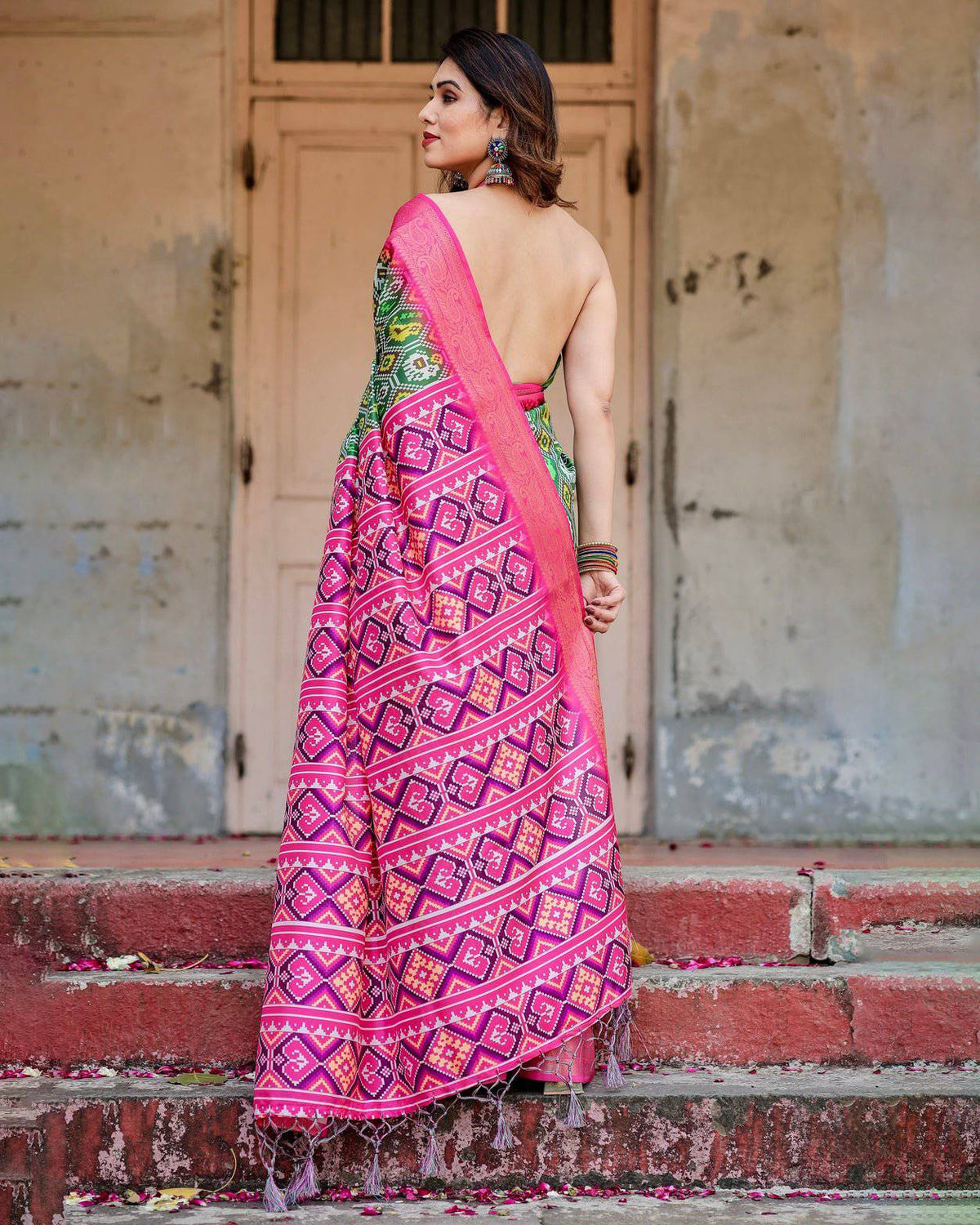 Green and Pink Tussar Silk Saree with Vibrant Ikat Patterns and Zari