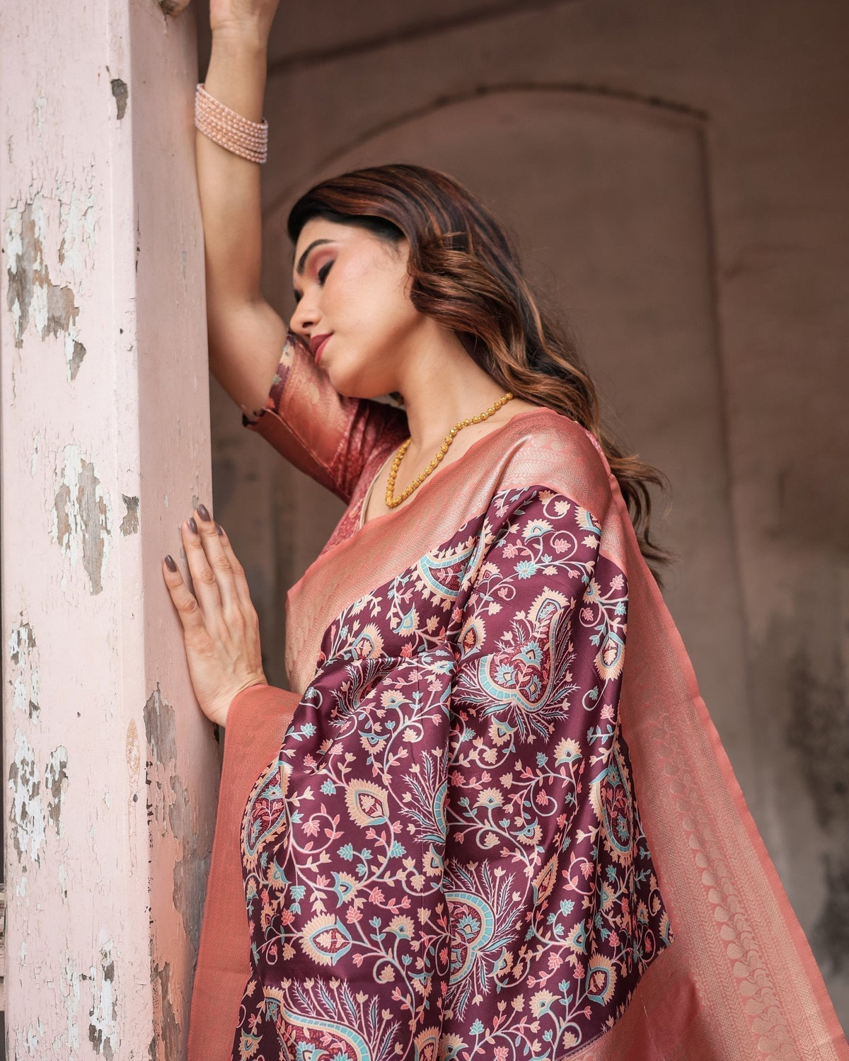 Maroon Banarasi Silk Saree with Peach Zari Border and Paisley Motifs