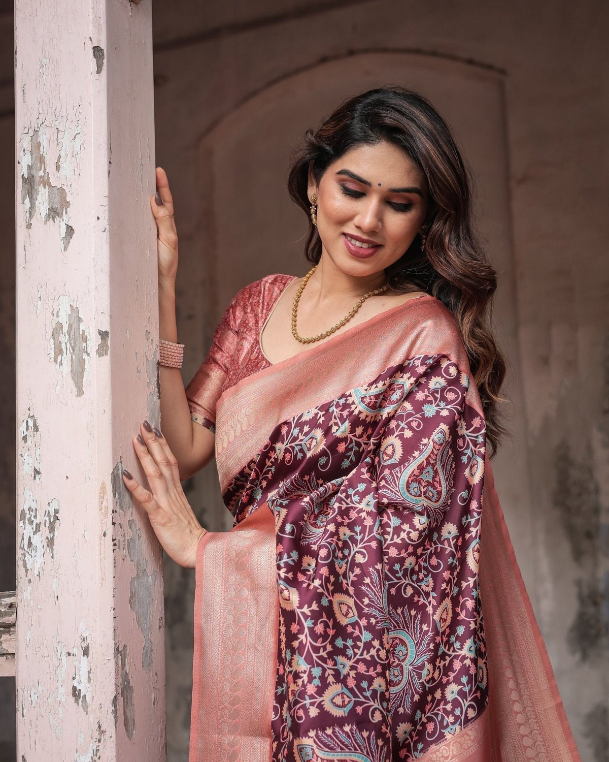 Maroon Banarasi Silk Saree with Peach Zari Border and Paisley Motifs