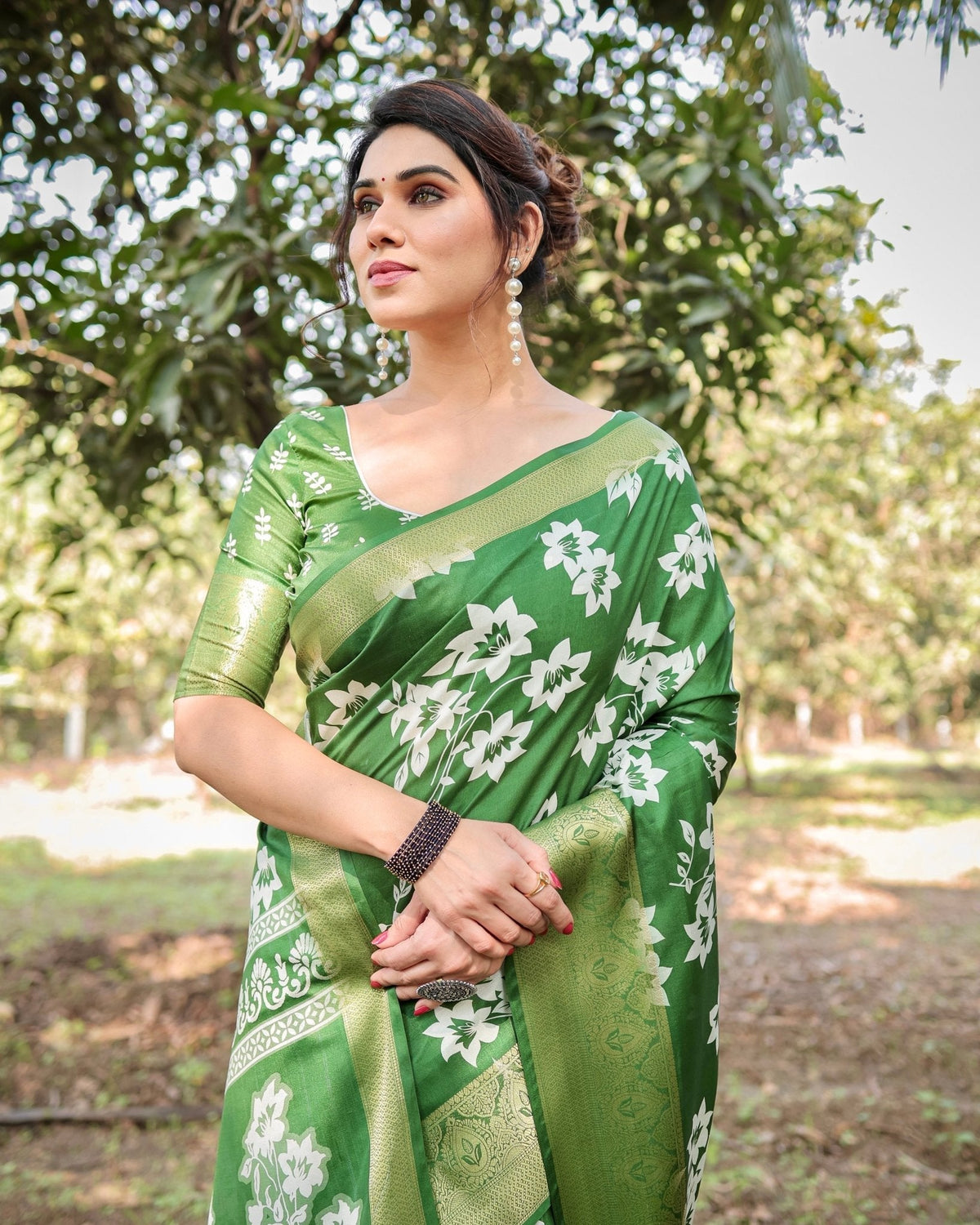 Enchanting Green Tussar Silk Saree with White Floral Prints and Zari