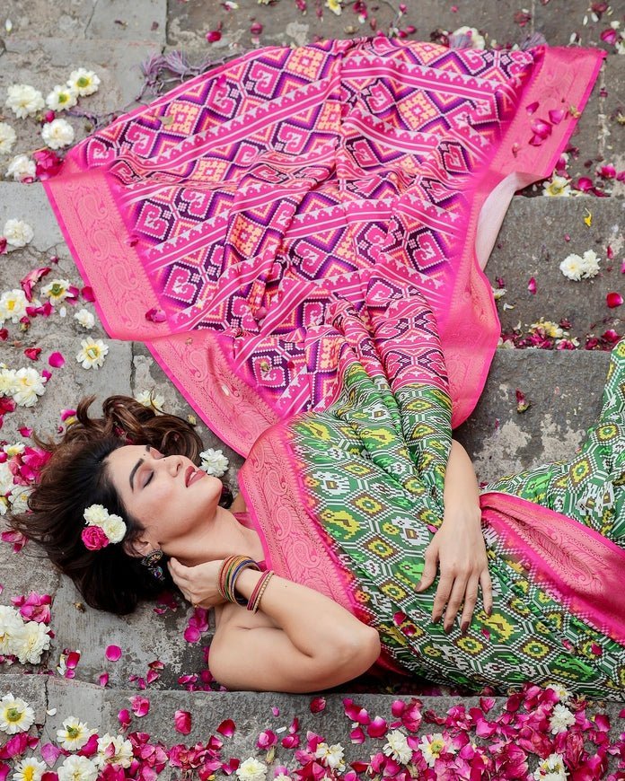 Green and Pink Tussar Silk Saree with Vibrant Ikat Patterns and Zari