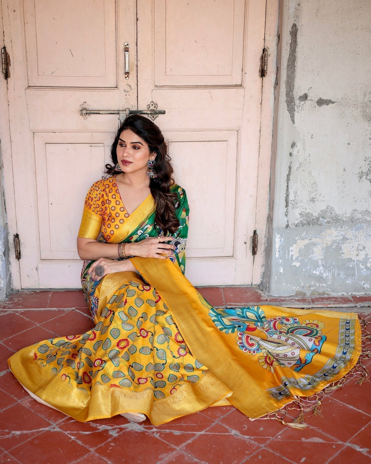 Golden Yellow Tussar Silk Saree with Vibrant Peacock Kalamkari Motifs