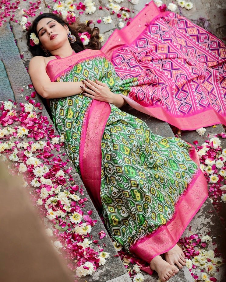 Green and Pink Tussar Silk Saree with Vibrant Ikat Patterns and Zari