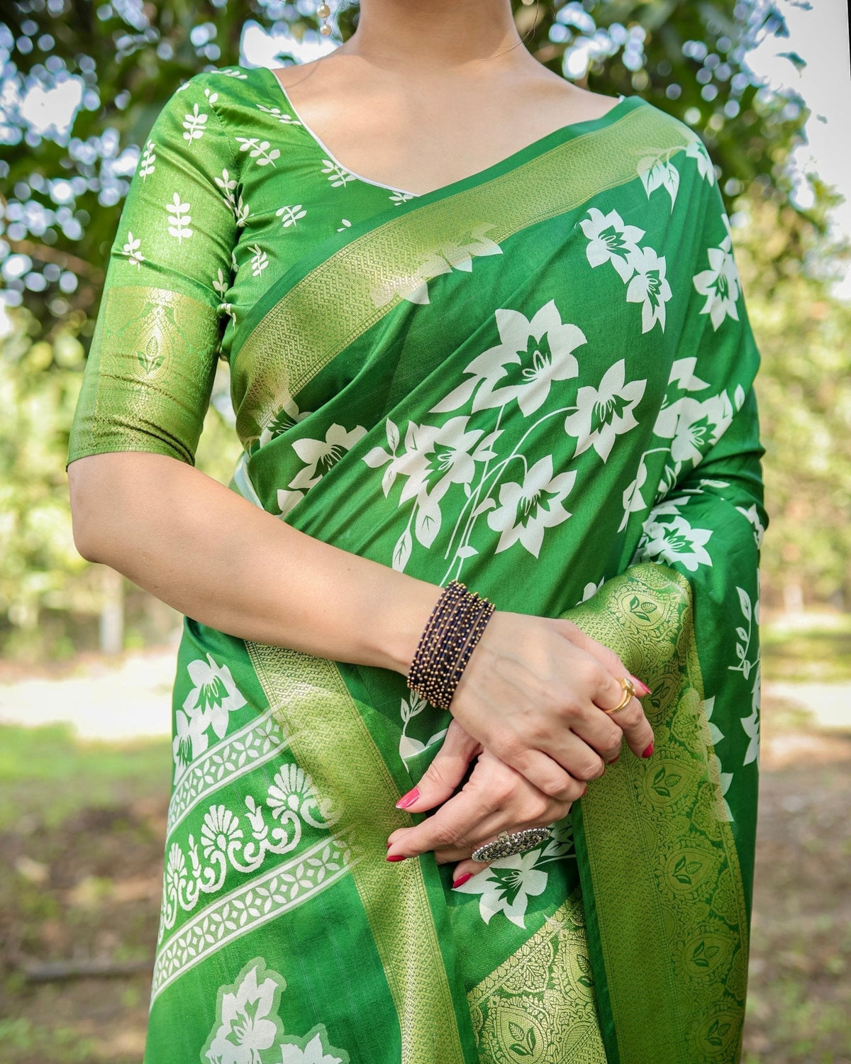 Enchanting Green Tussar Silk Saree with White Floral Prints and Zari