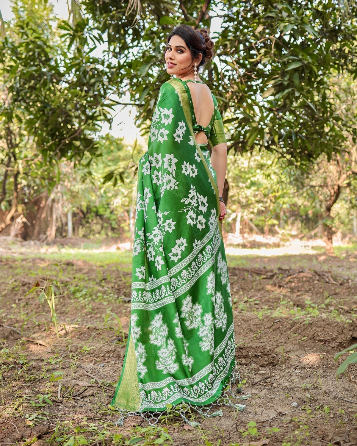 Enchanting Green Tussar Silk Saree with White Floral Prints and Zari