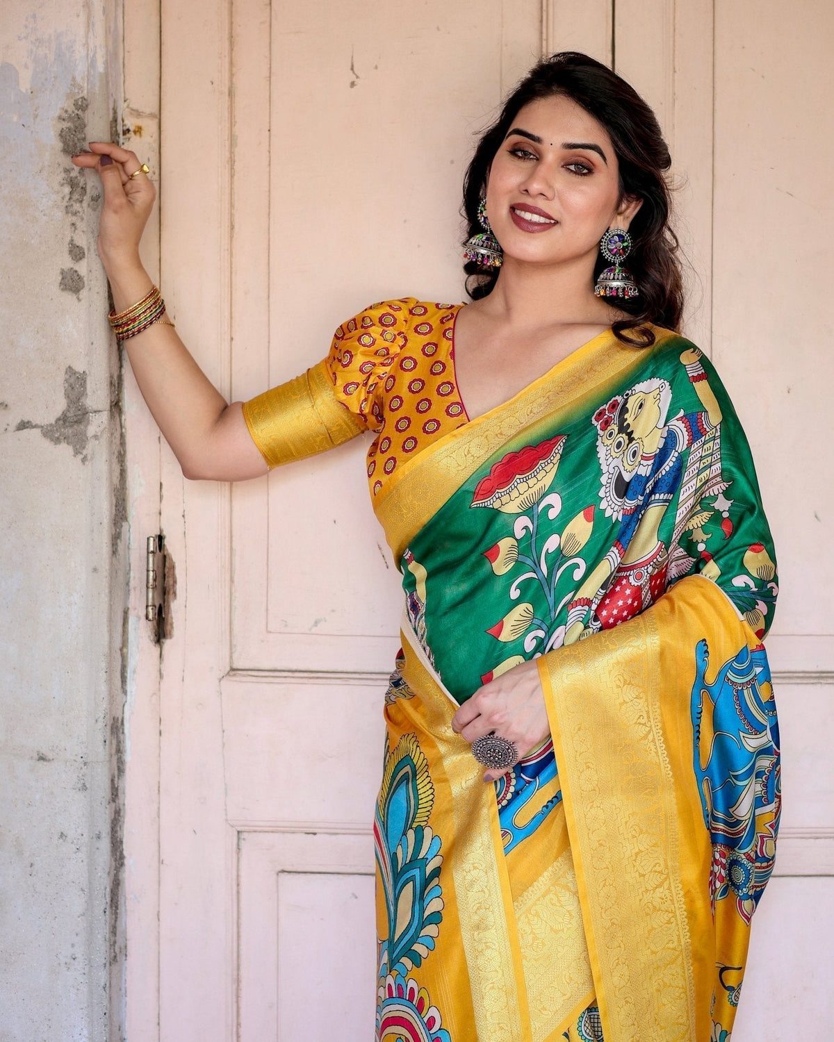 Golden Yellow Tussar Silk Saree with Vibrant Peacock Kalamkari Motifs