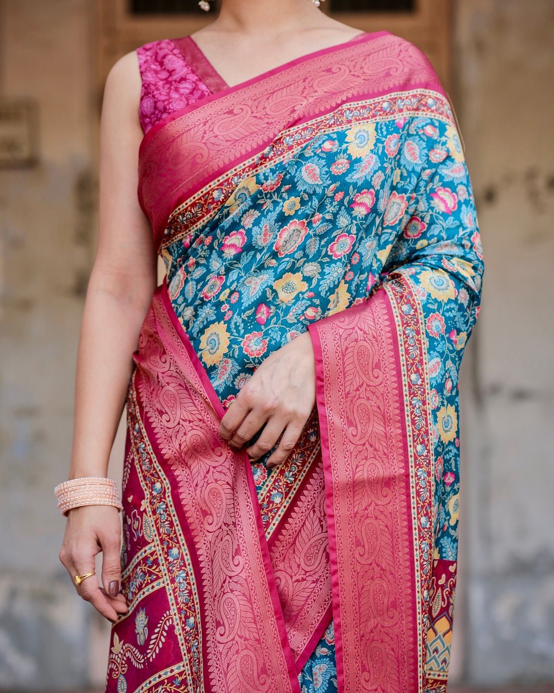 Teal Blue and Coral Tussar Silk Saree with Vibrant Floral Motifs and