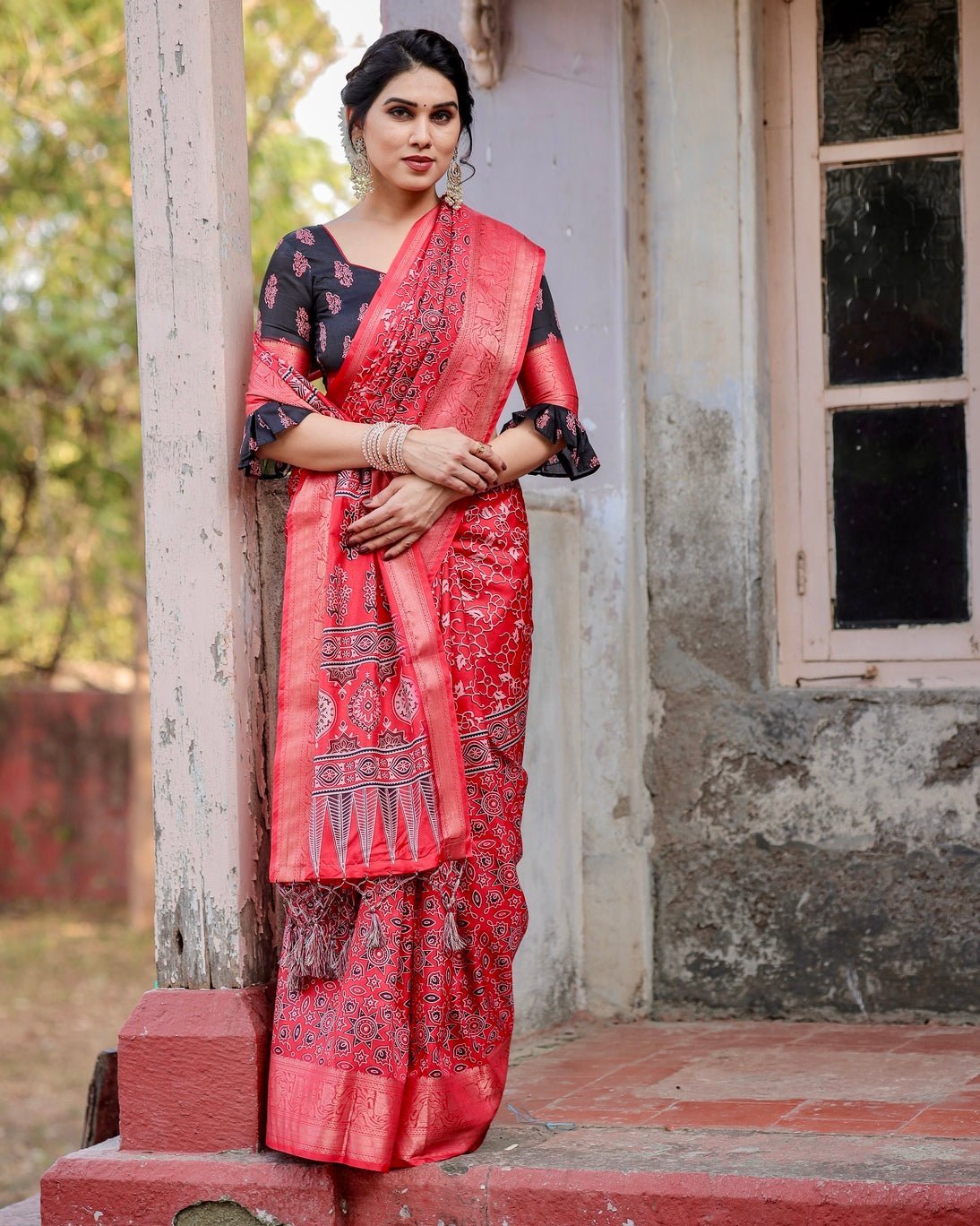 Fiery Red Tussar Silk Saree with Ornamental Motifs and Detailed Zari