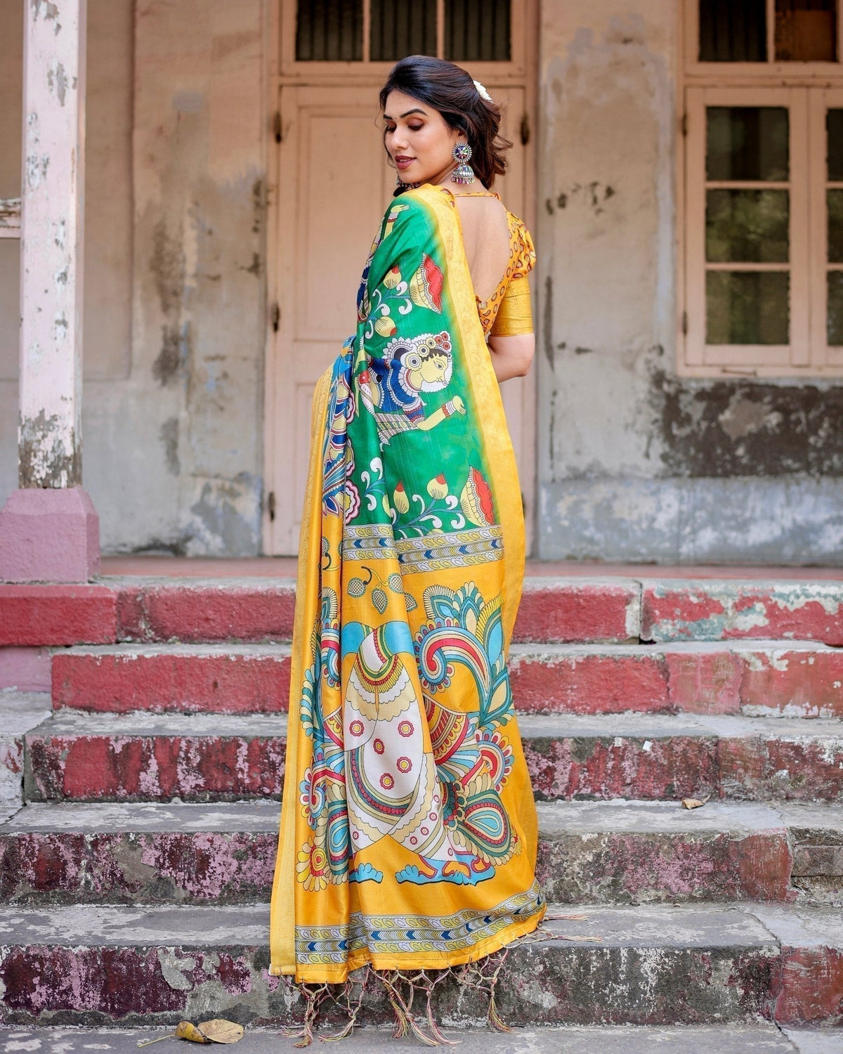 Golden Yellow Tussar Silk Saree with Vibrant Peacock Kalamkari Motifs