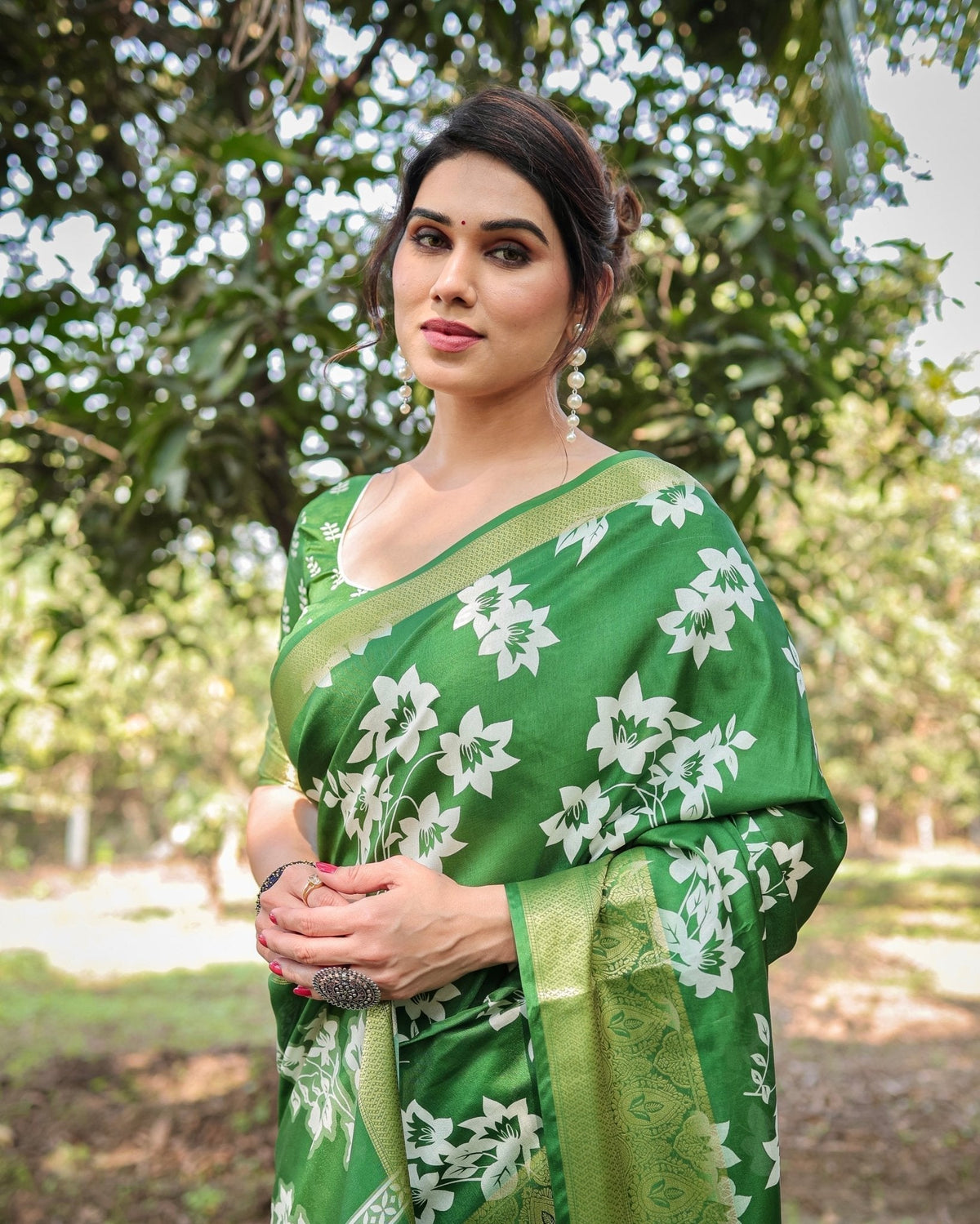 Enchanting Green Tussar Silk Saree with White Floral Prints and Zari