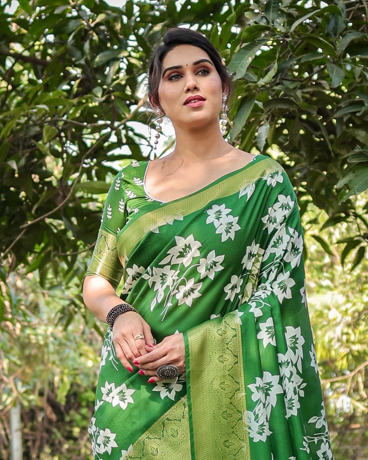 Enchanting Green Tussar Silk Saree with White Floral Prints and Zari