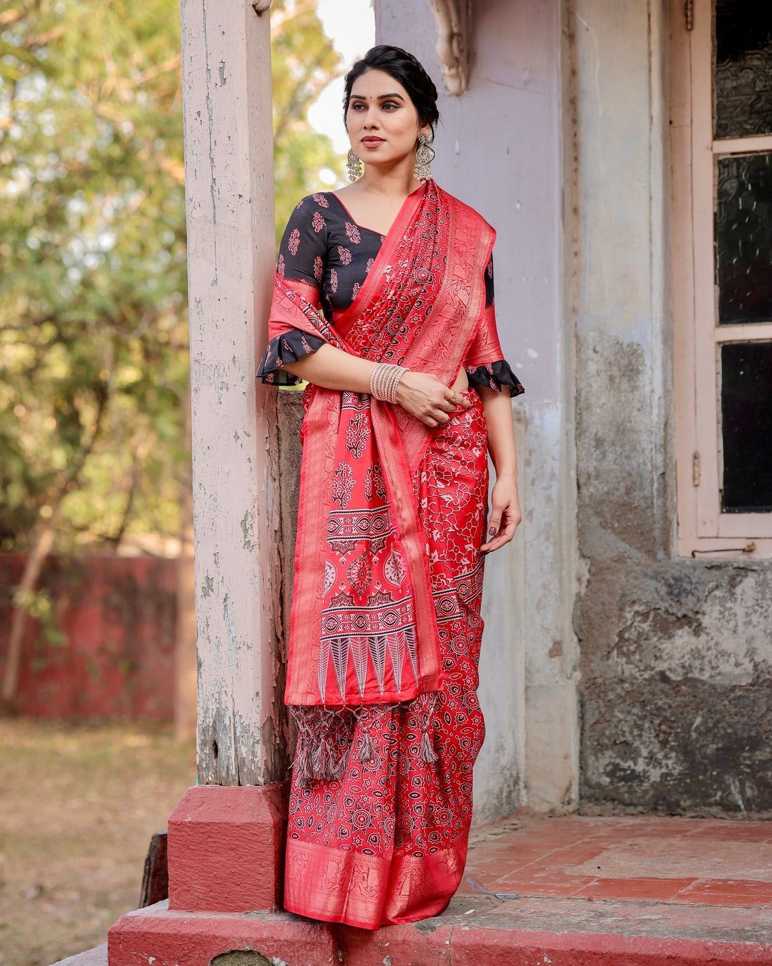 Fiery Red Tussar Silk Saree with Ornamental Motifs and Detailed Zari
