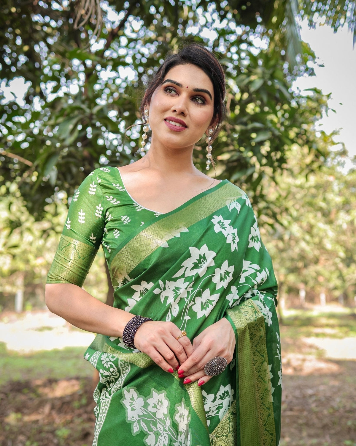 Enchanting Green Tussar Silk Saree with White Floral Prints and Zari