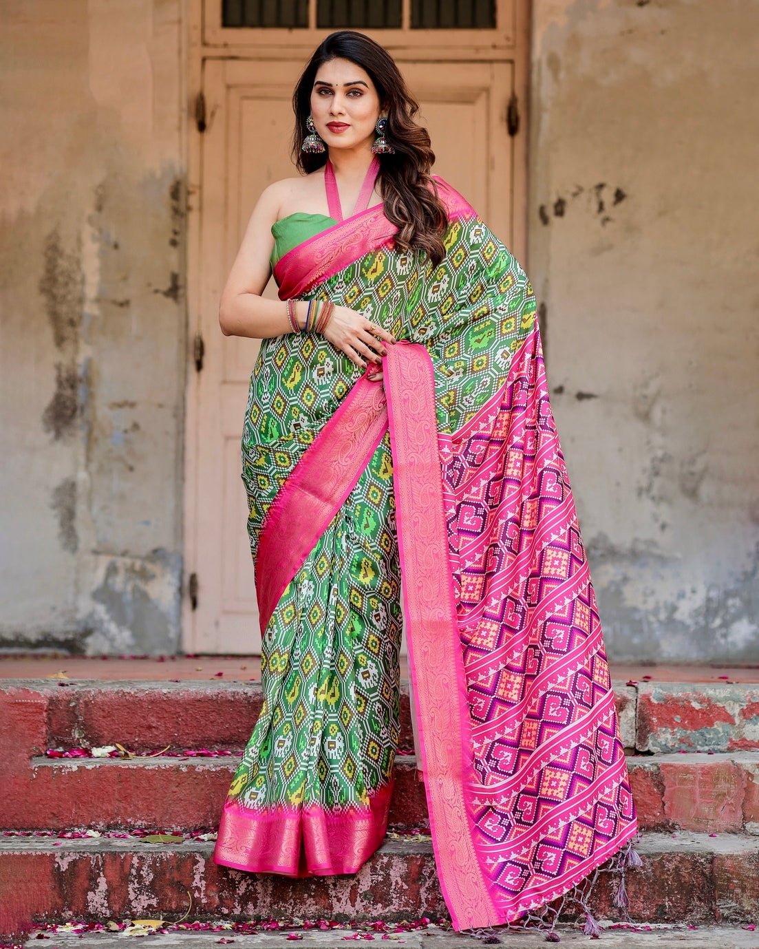 Green and Pink Tussar Silk Saree with Vibrant Ikat Patterns and Zari