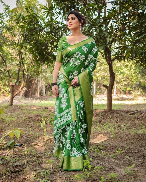 Enchanting Green Tussar Silk Saree with White Floral Prints and Zari
